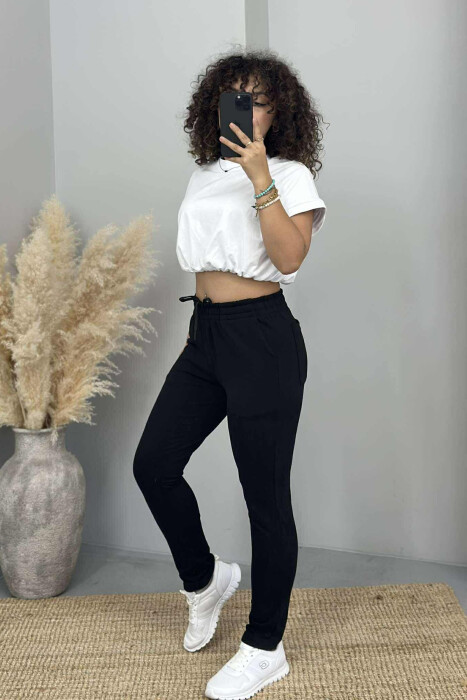 TUTA NJË NGJYRËSHE ME BEL ELASTIK PËR FEMRA NË NGJYRË TË ZEZË - 3