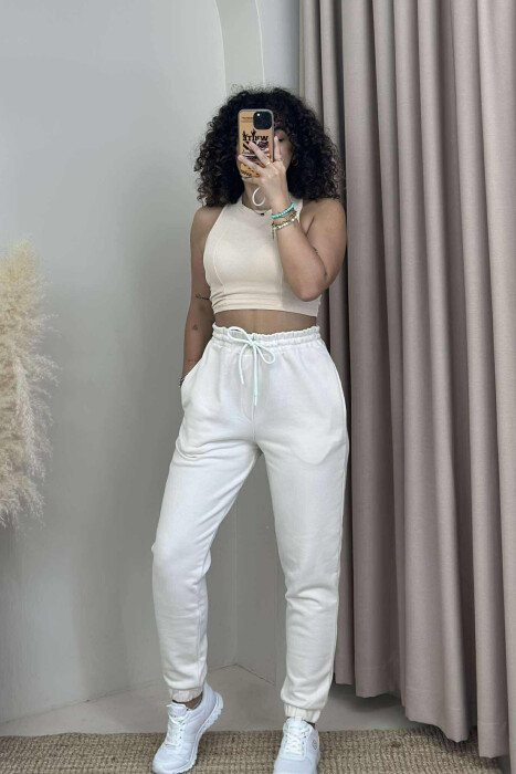 TUTA NJË NGJYRËSHE ME BEL ELASTIK PËR FEMRA NË NGJYRËN E BARDHË ANTIKE - 2