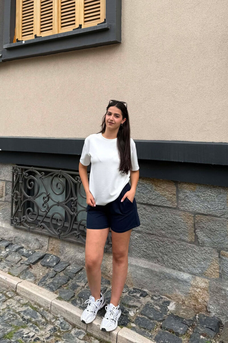 TUTA TE SHKURTRA ME BEL ELASTIK PER FEMRA NE NGJYRE BLU - 1