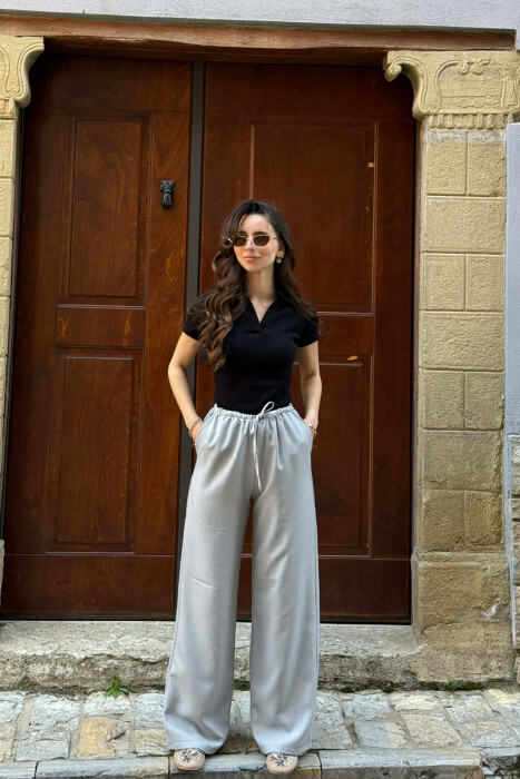 PANTALLONA ME BEL ELASTIK DHE ME DETAJIN E LIDHSEVE PER FEMRA NE NGJYRE GRI GRI - KLAUDIO FASHION