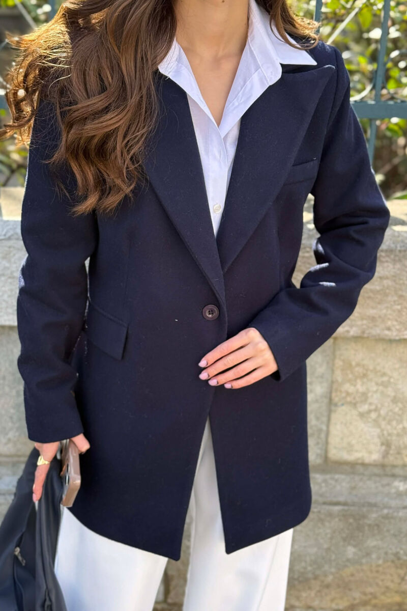 XHAKETE E THJESHTE NJE NGJYRESHE ME BUTONA PER FEMRA NE NGJYRE BLU TE ERRET - 4