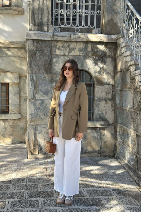 XHAKETE NJE NGJYRESHE ME BUTONA PER FEMRA NE NGJYRE ULLI - 4