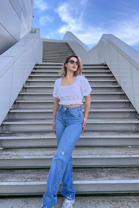 XHINSE NJË NGJYRËSHE PËR FEMRA NË NGJYRËN BLU E ZBARDHUR - 1